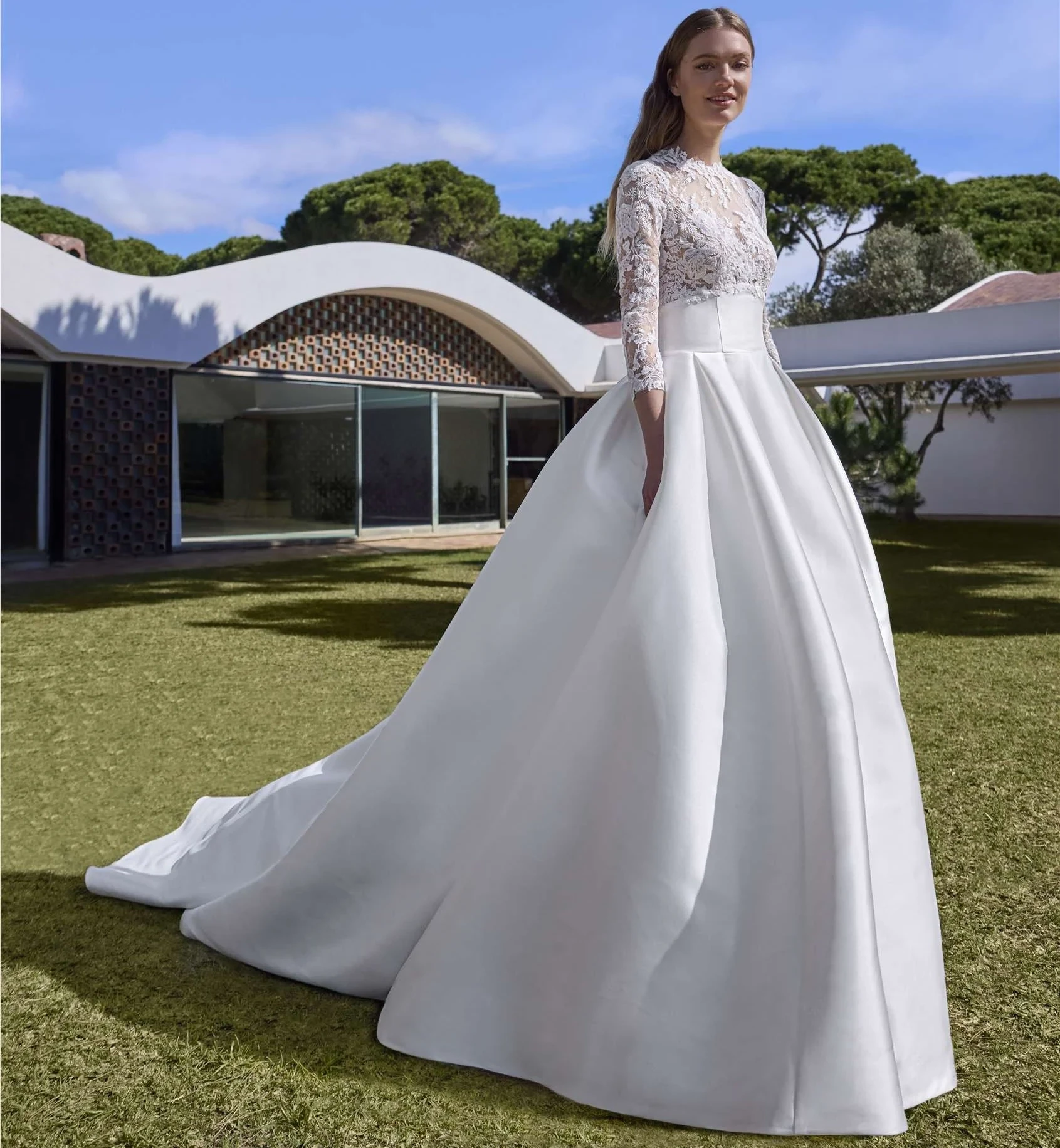 Model wearing a bridal Collection Gown by I Do Weddings & Photography