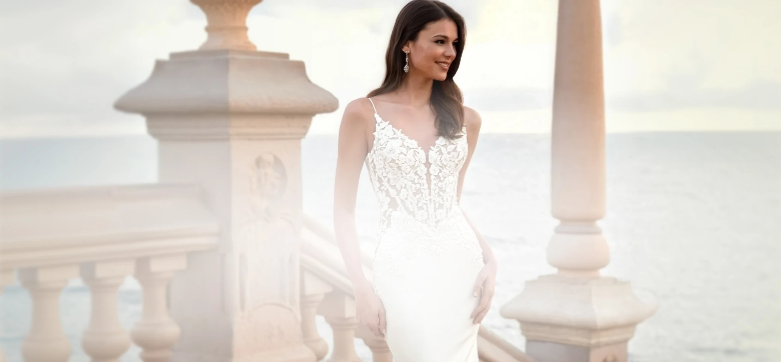 Model wearing Love by Enzoani dress, desktop banner